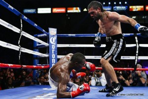 Angulo knocks down Lara