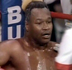 George Foreman Vs. Larry Holmes: Who Wins?