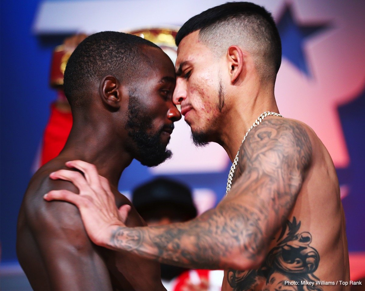 Terence Crawford takes a swing at Jose Benavidez at weigh-in