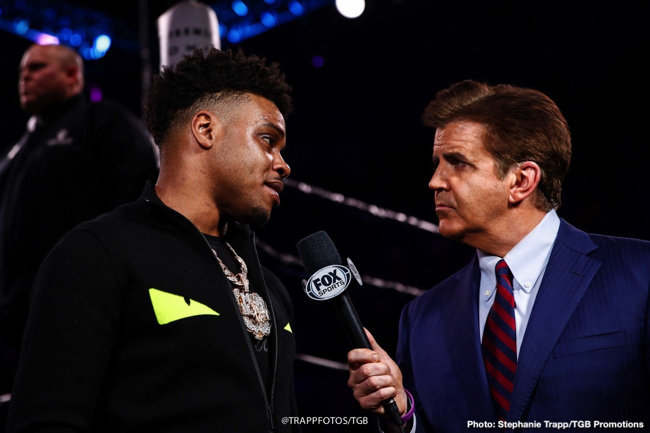 Errol Spence Jr and trainer Derrick James talk to Custer