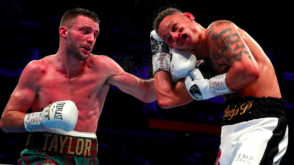 Josh Taylor defends against Apinun Khongsong on Sept.26 on ESPN+