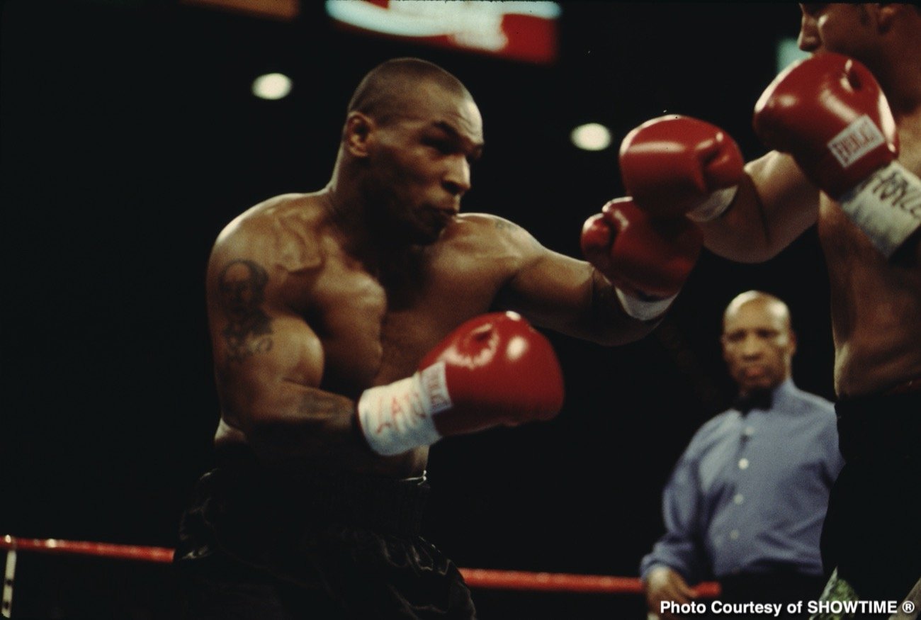 Evander Holyfield, Mike Tyson boxing image / photo
