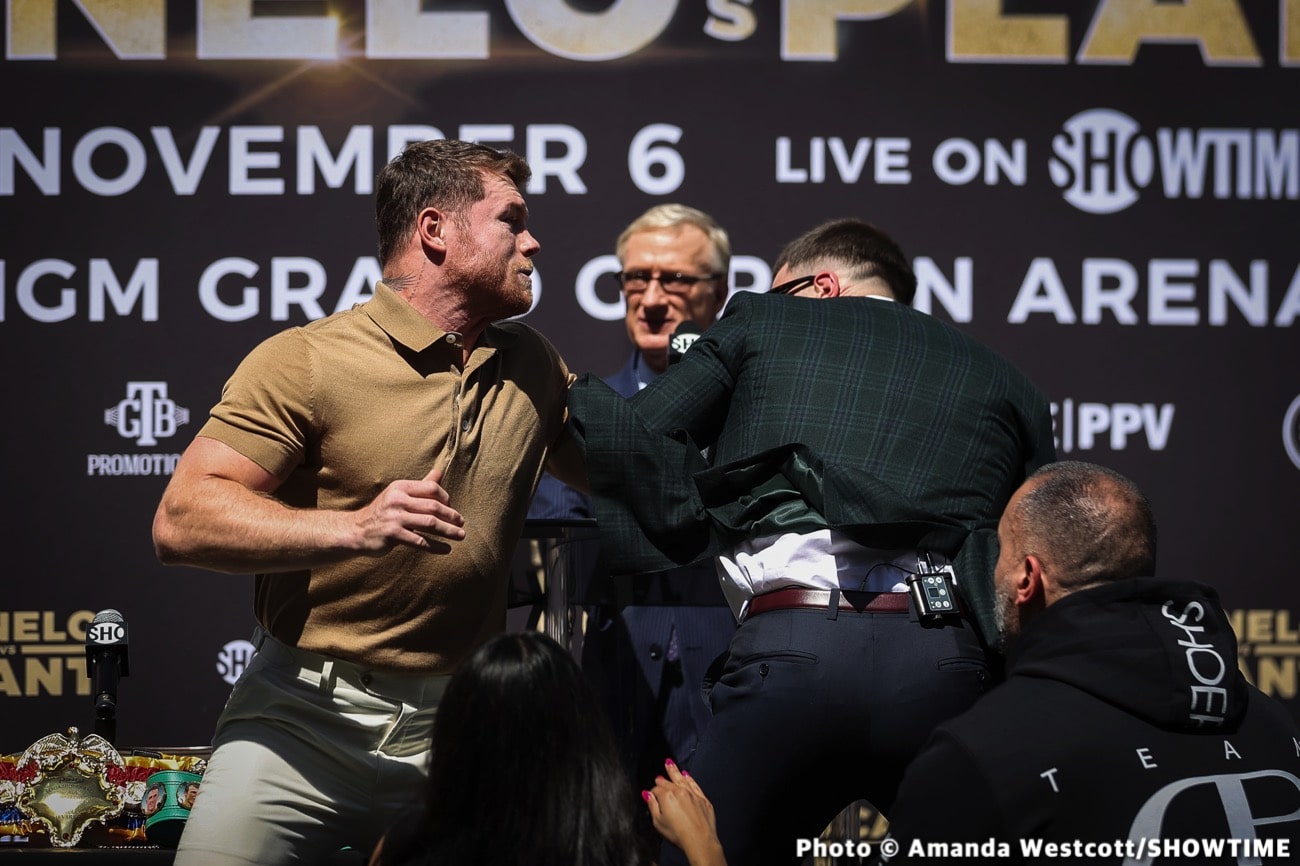 Caleb Plant punches Canelo Alvarez in the jaw during face off