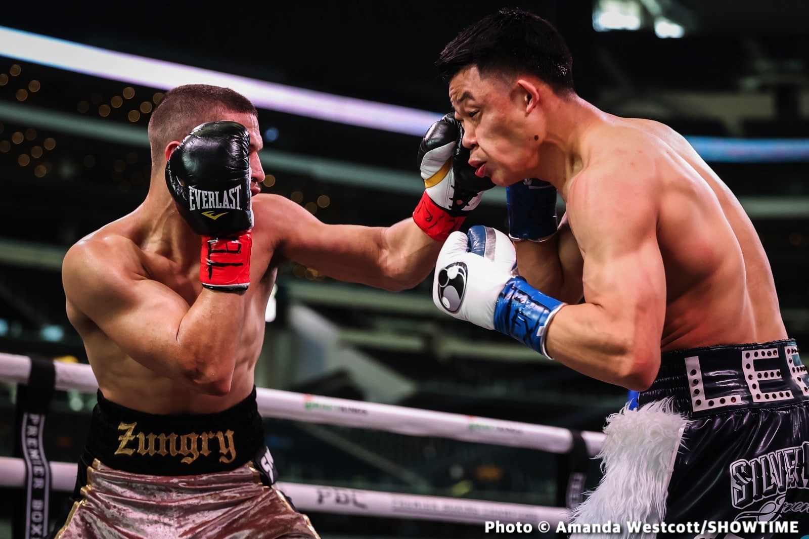 Photos: Spence TKOs Ugas in 10th, Cruz Dominates Gamboa