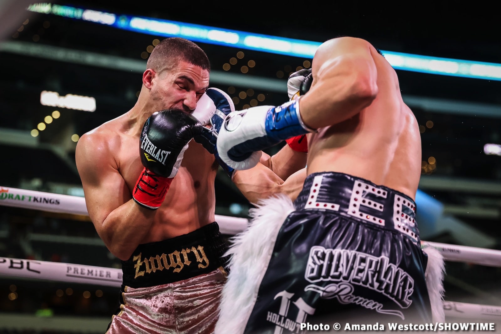 Photos: Spence TKOs Ugas in 10th, Cruz Dominates Gamboa
