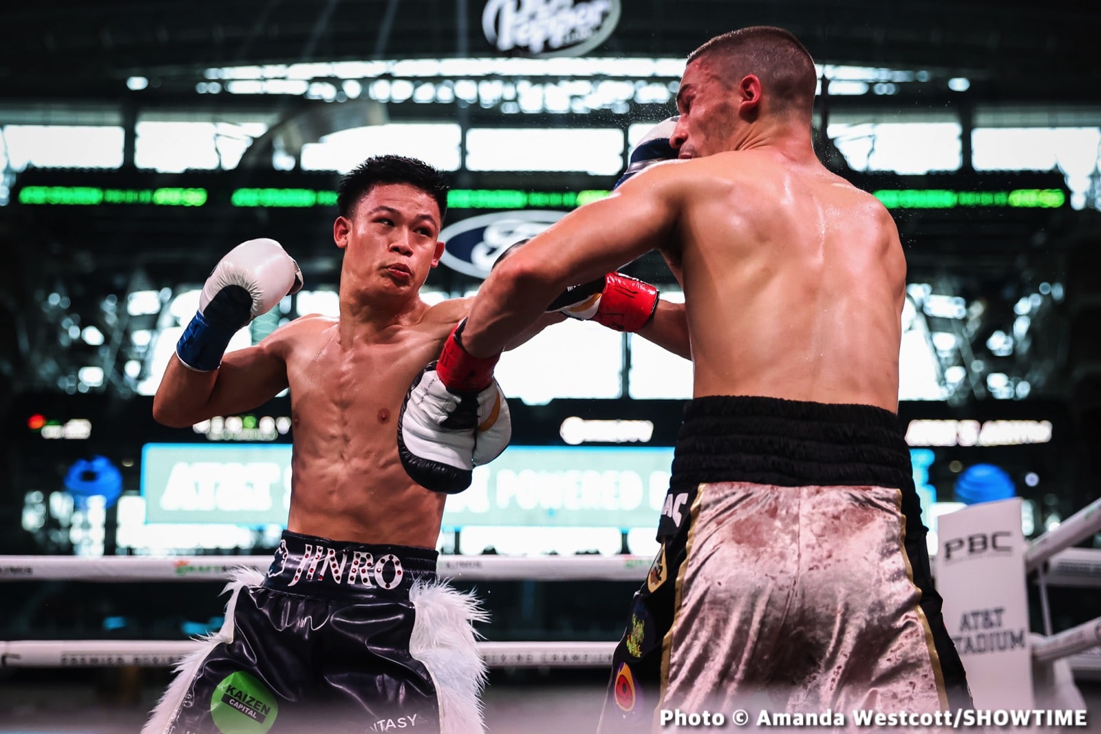 Photos: Spence TKOs Ugas in 10th, Cruz Dominates Gamboa