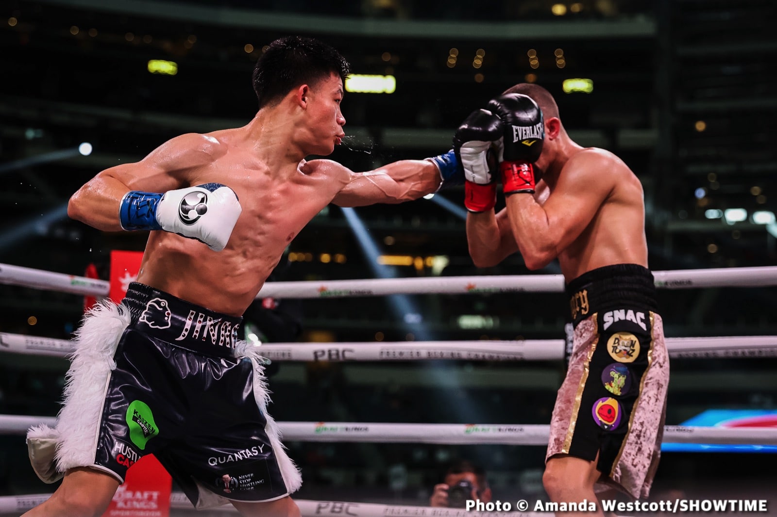 Photos: Spence TKOs Ugas in 10th, Cruz Dominates Gamboa