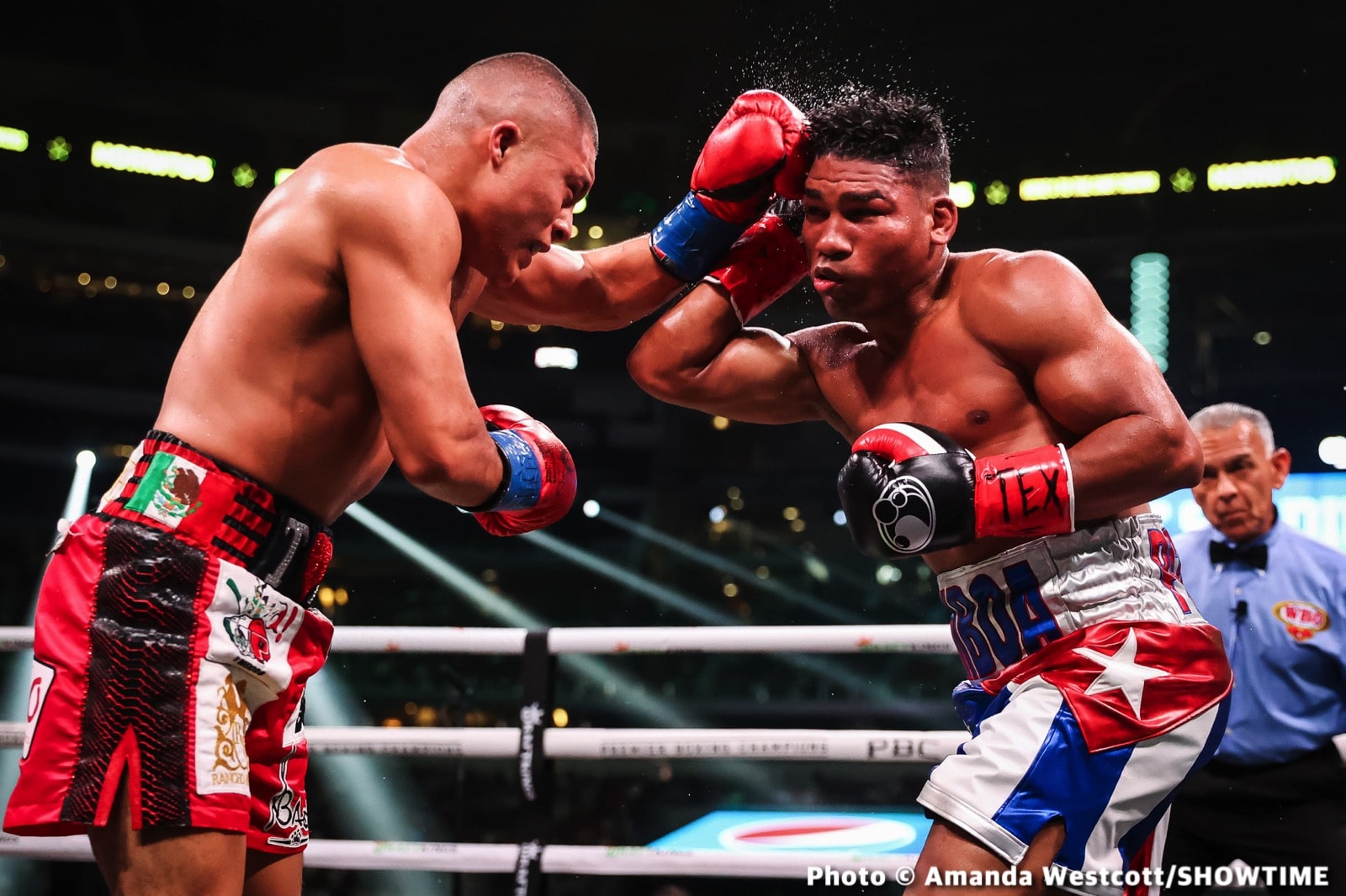 Photos: Spence TKOs Ugas in 10th, Cruz Dominates Gamboa