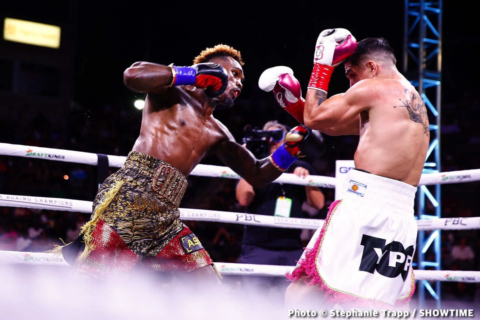 Photos: Jermell Charlo KOs Castano, Ennis Crushes Clayton!