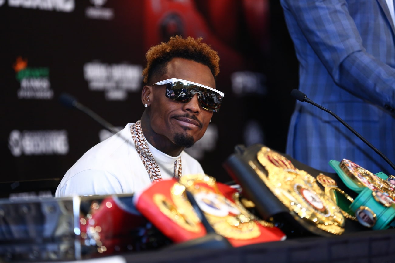 Jermell Charlo showing off his belt collection