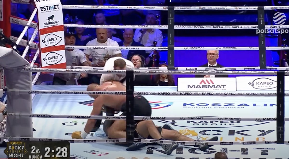Crazy Scenes In Poland As MMA Fighter Reverts Back To MMA Move In Boxing Debut!