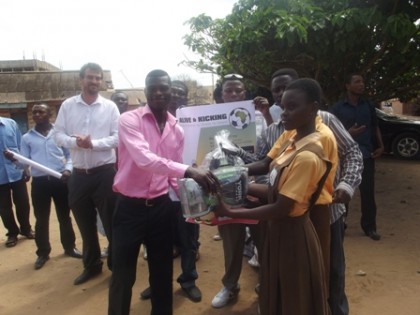 New ALIVE AND KICKING Ambassador Commey presents gloves and balls