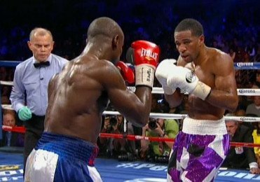 Peterson beats Jean by 12 round decision; Charlos decisions Rosado